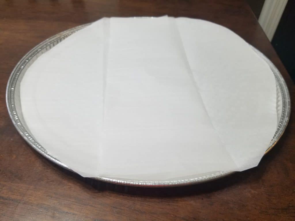 parchment paper lined pizza pan